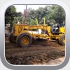 After mixing we started to grade the road and get it ready for compaction